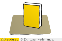 Een boek staat op tafel